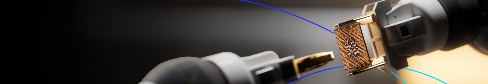 Close-up view of a robotic arm holding a microchip, highlighting intricate circuit details.