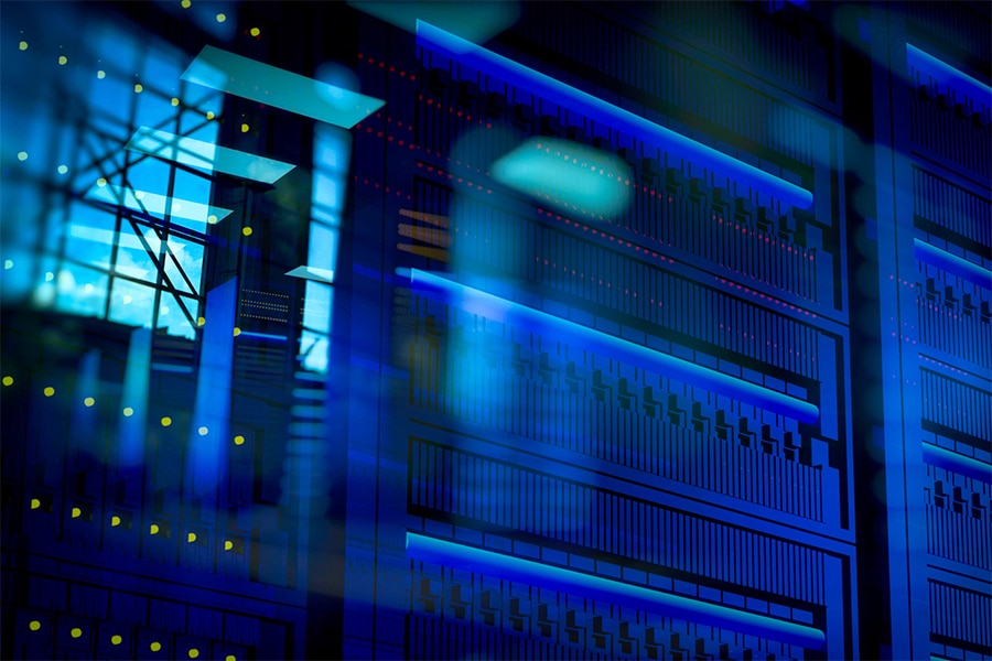 Digital reflections illuminate sleek blue server systems.