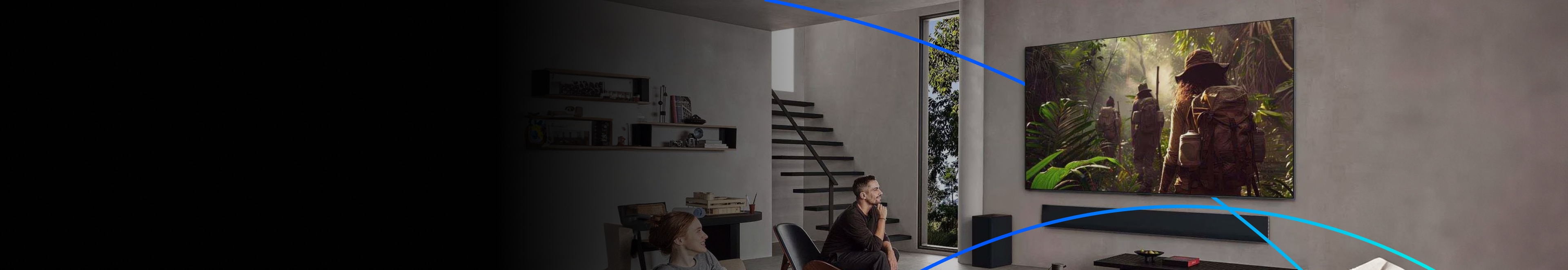 Couple enjoying cinematic visuals on a large LG OLED evo TV in a modern living room.