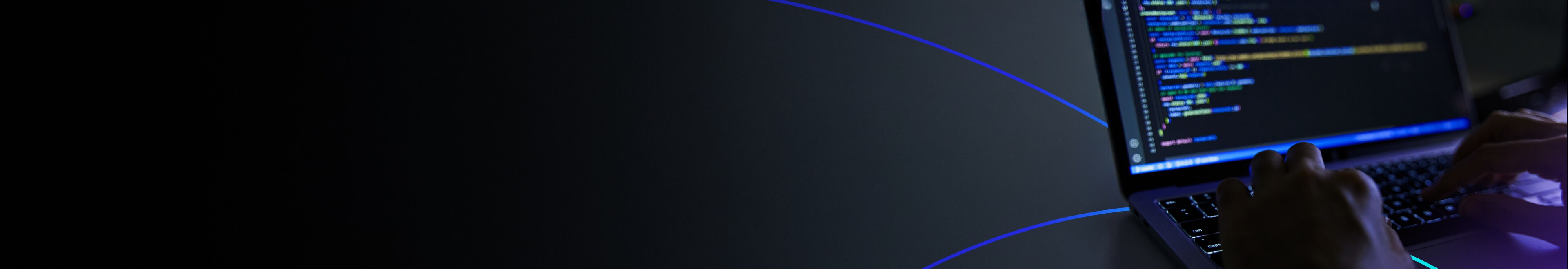 Pytorch program masthead hero banner - Developer writing code on laptop with colorful programming script on screen.