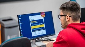 Student using the computing equipment at ARU. 